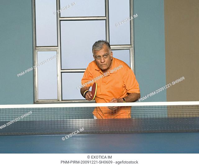 Man playing table tennis