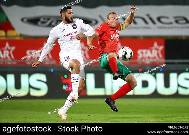 Anderlecht's Elias Cobbaut and Oostende's Kevin Vandendriessche fight for the ball during a soccer match between KV Oostende and RSC Anderlecht