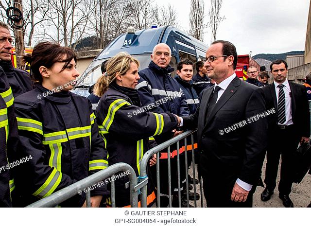 FRANCOIS HOLLANDE, PRESIDENT OF FRANCE, SALUTING THE FIRE DEPARTMENT AT THE MORTUARY FOLLOWING THE CRASH OF GERMANWINGS AIRLINE'S AIRBUS A320, LE VERNET