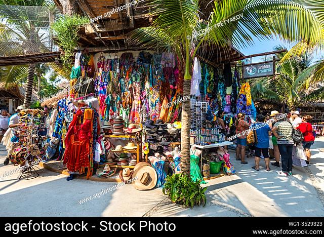 Costa Maya, Mexico - April 26, 2019: Street view at day with tourists near souvenir shops in Costa Maya, Mexico. Today the town is one of Mexican most top...