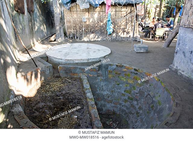 A bio gas plant at Tajhaat village, outskirts of Rangpur Town, December 10, 2008 Biogas based on the phenomenon of microbial decomposition of organic matter in...