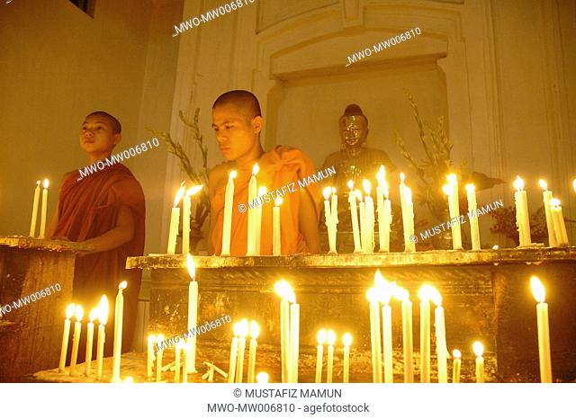 Two youngest monks at Dharma Rajik Buddha Bihara, a famous Buddhist monastery in Dhaka Bangladesh May 2, 2007