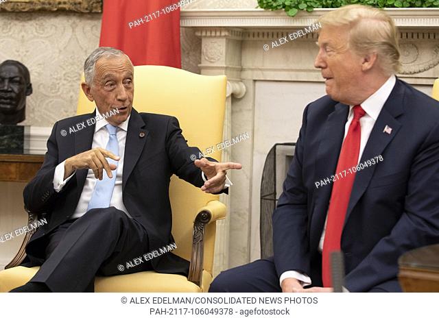 United States President Donald Trump listens as he meets with The President of Portugal Marcelo Rebelo de Sousa in the Oval Office at the White House in...
