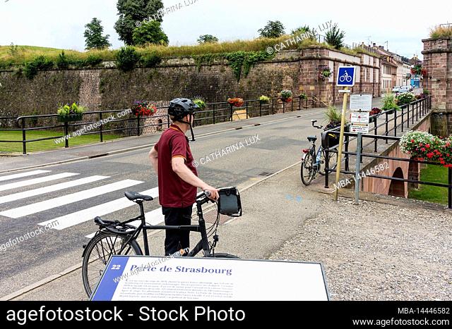 France, Neuf-Brisach, UNESCO World Heritage Site, Fortifications of Vauban, Porte de Strasbourg, cyclist