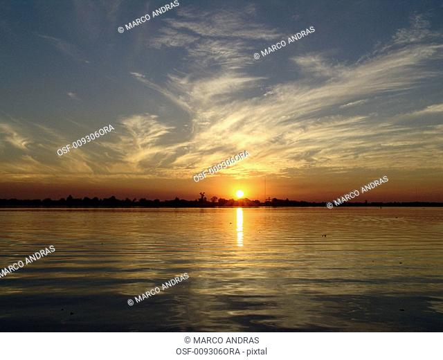 porto alegre sun setting on guaiba lake
