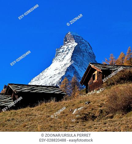 Peak of Mt Matterhorn and old timber huts