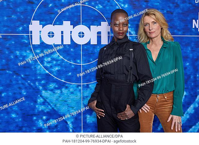 03 December 2018, Hamburg: The actresses Florence Kasumba (l) and Maria Furtwängler are standing in front of a logo wall at an NDR photo shoot of the new...