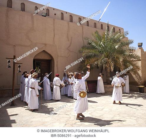 Performance, traditional sword dance, Fort Nizwa, Nizwa, Ad Dakhiliyah, Oman, Asia