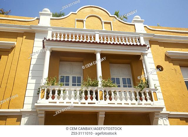 View to the balcony on the facade of a colonial buildig at the historic center, Cartagena de Indias, Bolivar, Colombia, South America