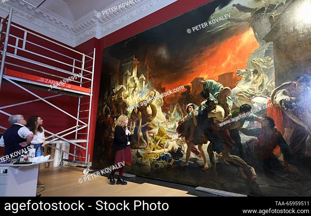 RUSSIA, ST PETERSBURG - DECEMBER 21, 2023: The museum's officials and a journalist are seen during a press briefing on the start of restoration of Karl...