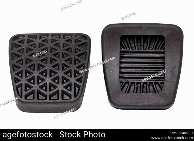 Rubber spare parts for cars. Closeup of two new rubber covers for Clutch pedal and brake pedal for cars isolated on white background