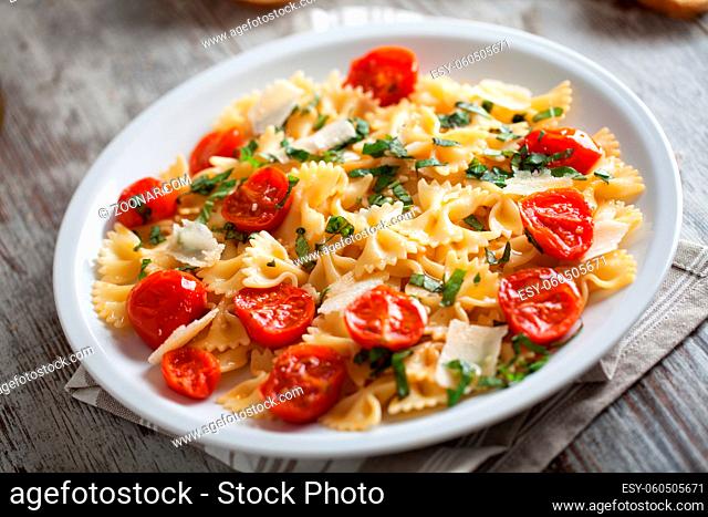 Pasta with fresh tomatoes and basil. High quality photo