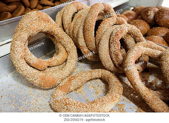 Fresh koulouri sesame bread rings on the tray in the bakery, Mykonos, Cyclades Islands, Greek Islands, Greece, Europe