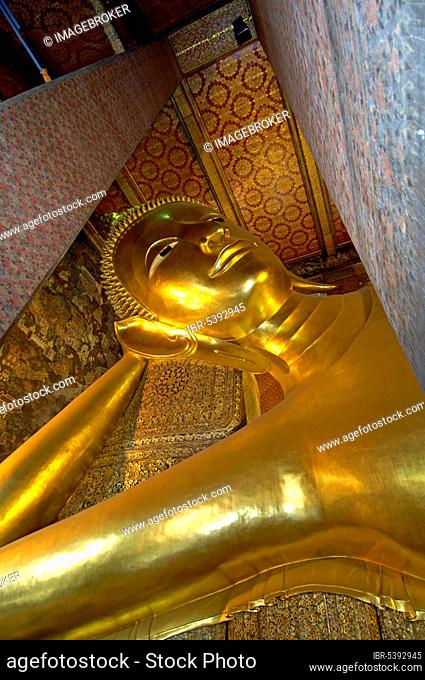 Head of a Buddha statue, 10 metres high, 40 metres long, Temple of the Reclining Buddha, Wat Pho, Bangkok, Thailand, Asia