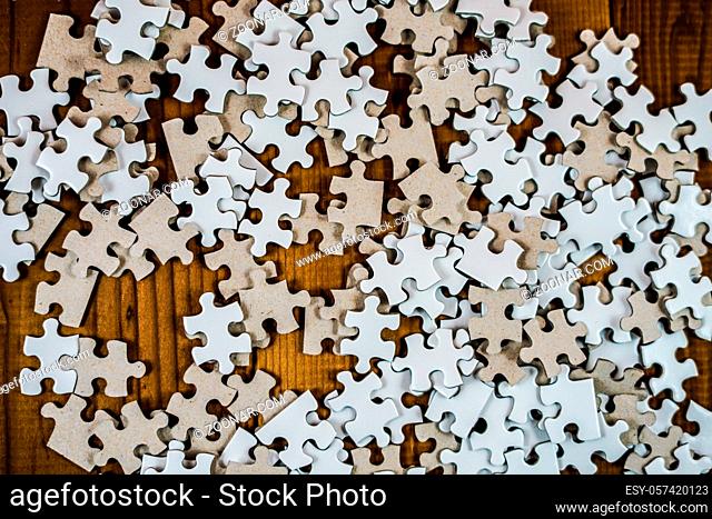 White jigsaw puzzle that has been placed on a desk. Shooting Location: Yokohama-city kanagawa prefecture