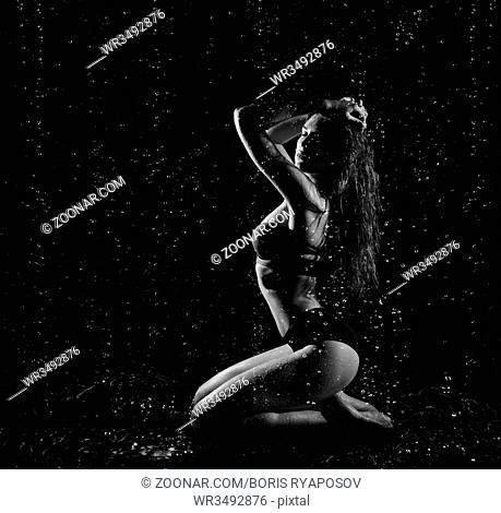 Young woman with water drops (monochrome ver)