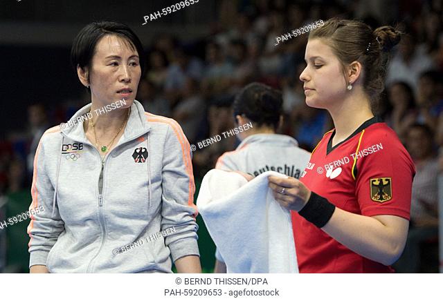 Germanys coach Jie Schoepp and player Petrissa Solja talk to eachother in the Women's table tennis team Final against the Netherlands in the Baku Sports Arena...
