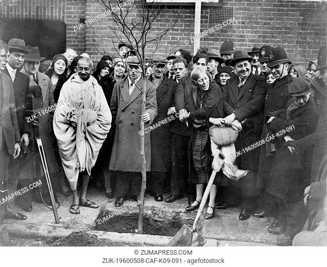 Dec. 4, 1931 - London, England, U.K. - Mr. MAHATMA GANDHI planted a tree outside Kingsley Hall, in memory of his stay there. Mr