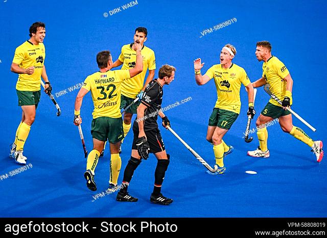 Australia's Jeremy Hayward, Australia's Aran Zalewski and Australia's Tom Wickham celebrate during a game between Australia and Germany
