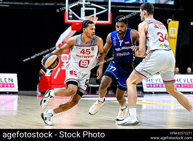 Antwerp's Rasir Bolton, Mons' Kyle Castlin and Antwerp's Jackson Rocky Kreuser pictured in action during a basketball match between Antwerp Giants and Mons...
