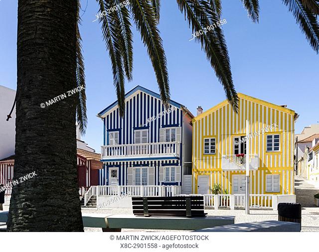 Colorful houses of Costa Nova, a seaside resort and suburb of Aveiro. Aveiro in Portugal on the coast of the Atlantic. Because of the many channels Aveiro is...