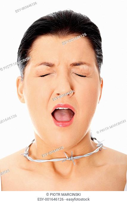 Young woman with barbed wire around her throat