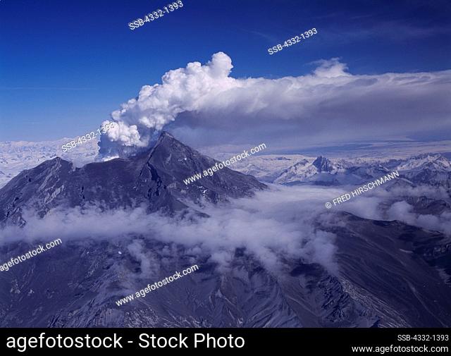 Aerial view of dome-building steam and ash eruption of Redoubt Volcano on April 5, 2009, Lake Clark National Park, Alaska