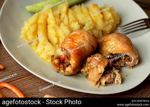 Baked chicken rolls with mashed potatoes