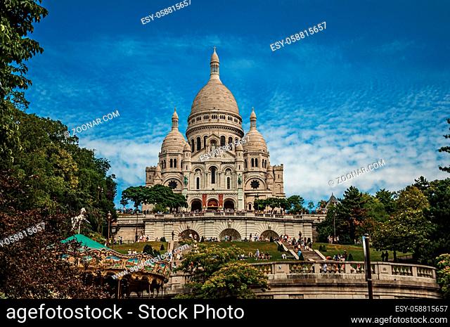 Staircase, domes and facade of the Basilica of Sacre Coeur at the Montmartre district in Paris. Known as the ?City of Light?
