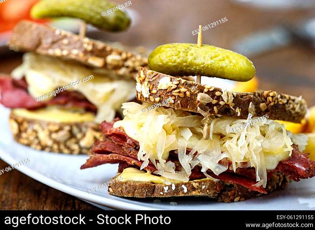 reuben sandwich on rustic wood