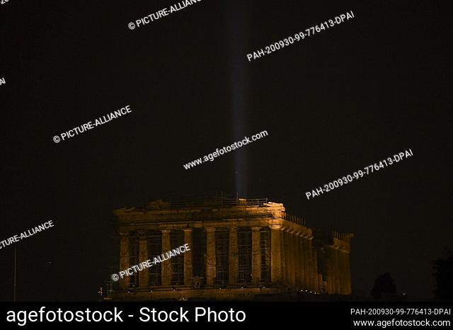 30 September 2020, Greece, Athen: The Acropolis shines in a new light: a new lighting system has been inaugurated by the Ministry of Culture at the...
