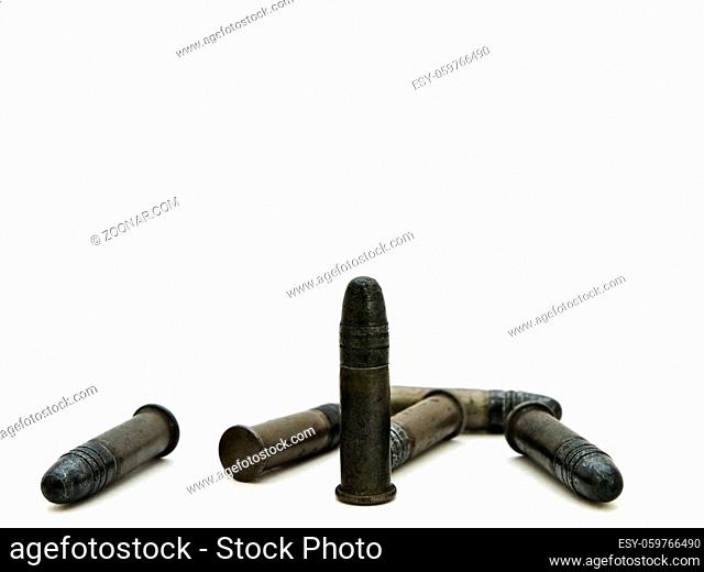 Photo Of Old Metal Bullets Against White Background