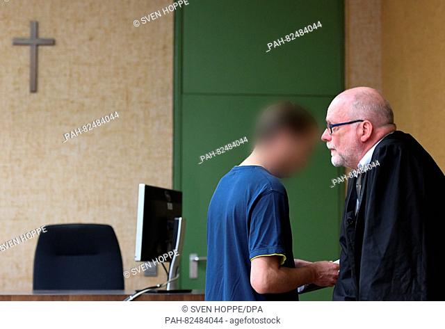 The defendant Juergen R. (L), a former religion teacher at the boarding school at Ettal Abbey on trial for sexual abuse, stands with his lawyer Jost...