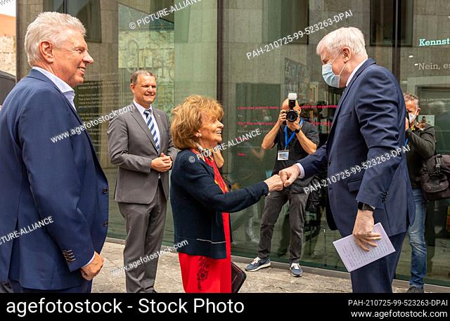 25 July 2021, Bavaria, Munich: Horst Seehofer (r, CSU), Federal Minister of the Interior, welcomes Charlotte Knobloch, President of the Jewish Community of...