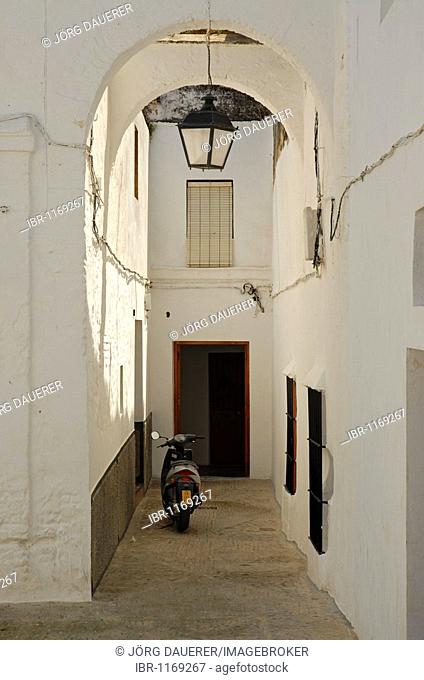 An alley with an arc in Arcos De la Frontera, Andalusia, Spain, Europe