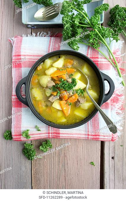 Potato soup with carrots and beef