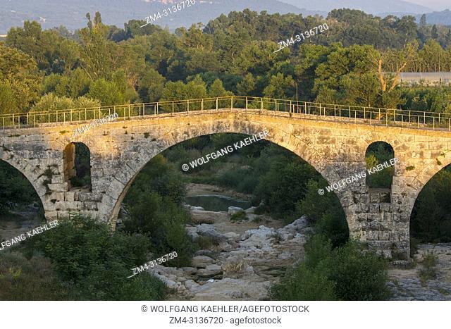 The Pont Julien is a Roman stone arch bridge over the Calavon River, in the Provence in southern France, dating from 3 BC