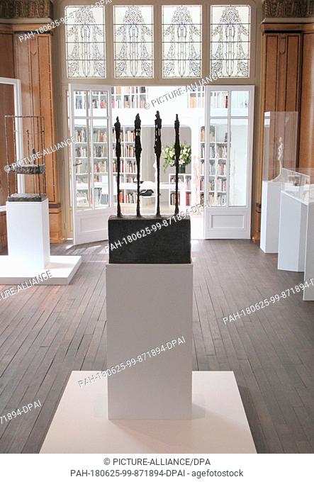 21 June 2018, France, Paris: The sculpture 'Four Figurines on a Stand' by Giacometti in the Giacometti Institute. Giacometti is one of the most significant