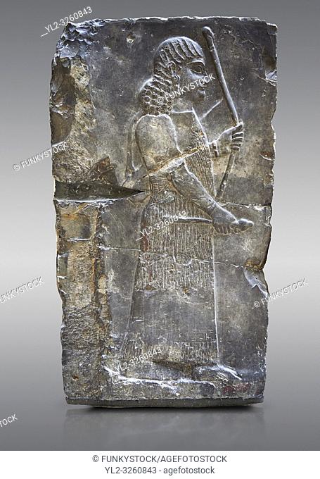 Stone relief sculptured panel of an archer. Inv AO 19885 from Dur Sharrukin the palace of Assyrian king Sargon II at Khorsabad, 713-706 BC