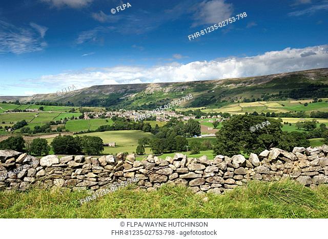 Village of Reeth from Harkerside, with Fremington Edge in distance, Swaledale, Yorkshire Dales, North Yorkshire, England, july