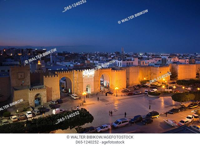 Tunisia, Tunisian Central Coast, Sfax, elevated view of the Medina along Avenue Ali Belhouane and Bab Diwan gate, dusk