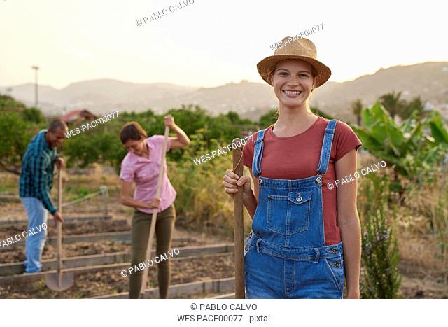 Portrait of smiling young farmer