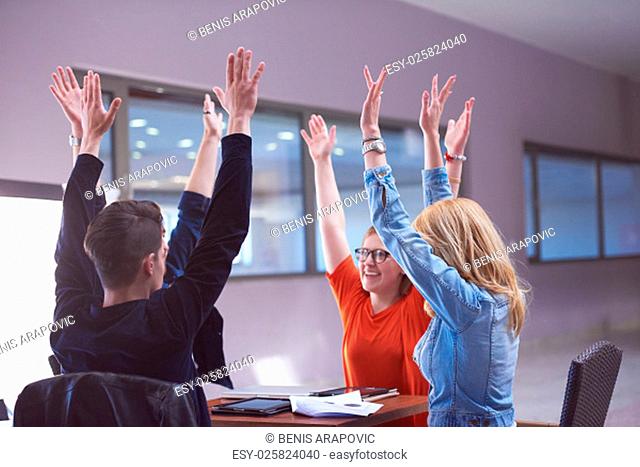 happy students celebrate, friends group together at school, young people raise hands, stack and get in circle formation together