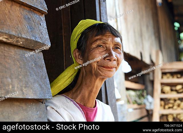 Head portrait of a Kayan Lahwi woman who has removed her brass neck coils . The Long Neck Kayan (also called Padaung in Burmese) are a sub-group of the Karen...
