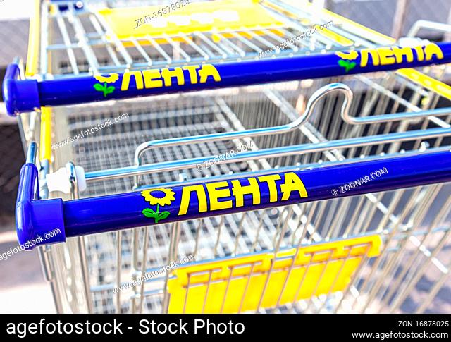 Samara, Russia - June 4, 2016: Shopping cart of Lenta store. Lenta is one of the largest retail chains in Russia. Selective focus