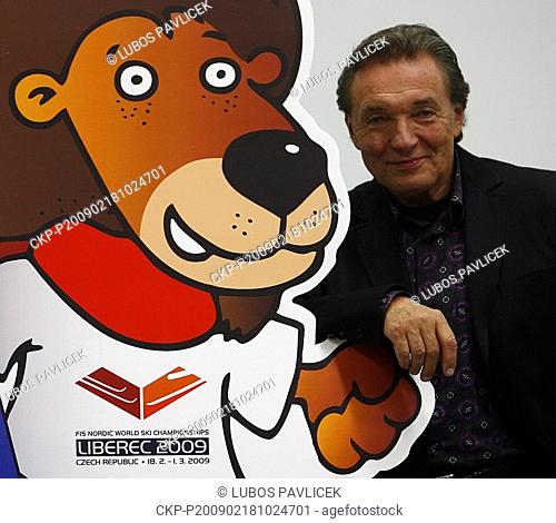 Czech singer Karel Gott poses with mascot during the opening gala ceremony of Nordic World Ski Championship in Liberec, some 100 kilometers north from Prague