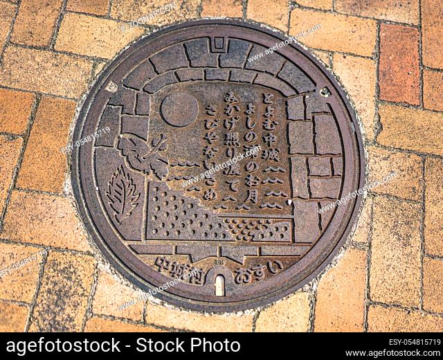 Manhole on the Agaiteida bridge which means East Sun on the Hanta road near the North Nakagusuku Castle in Okinawa Island