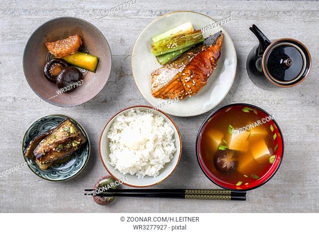 Traditional Japanese dish with Fish Teriyaki and Miso Soup as close-up in bowls
