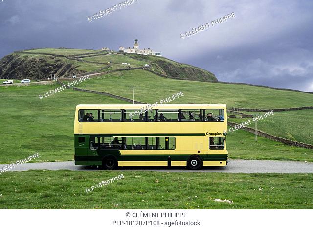 1988 Leyland Olympian double-decker bus driving along the Scottish coast, Scotland, UK