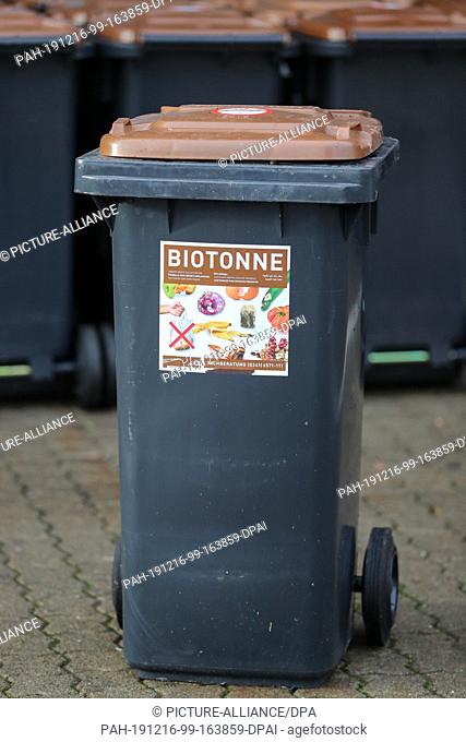 16 December 2019, Saxony, Leipzig: During an analysis of the amount and composition of waste, a so-called bio bin is placed on the premises of the city cleaning...